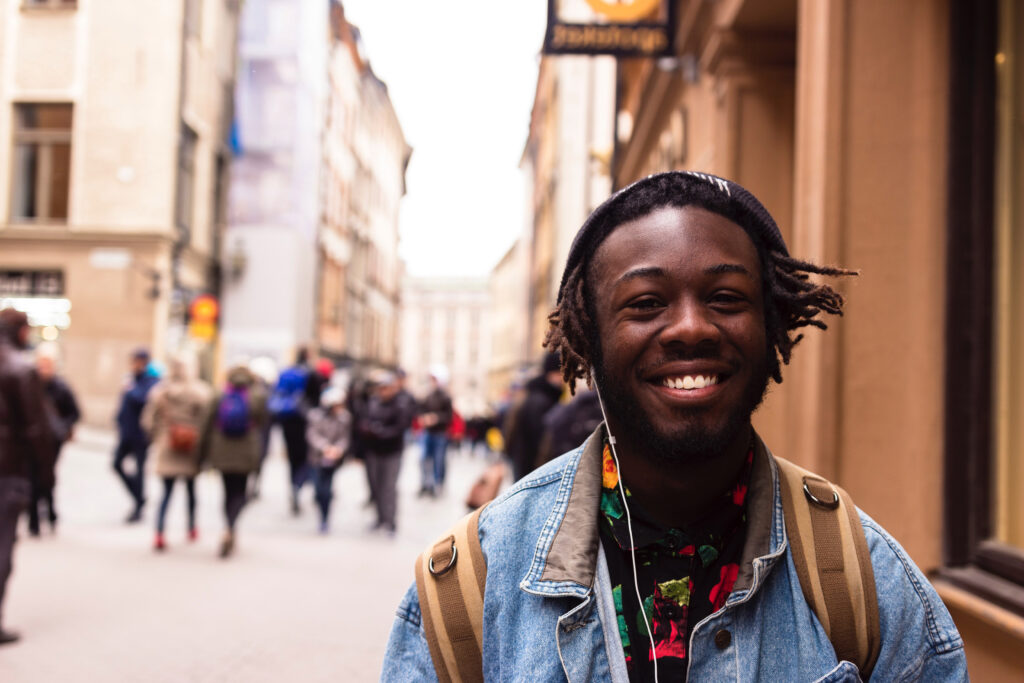 Photograph of smiling student on street